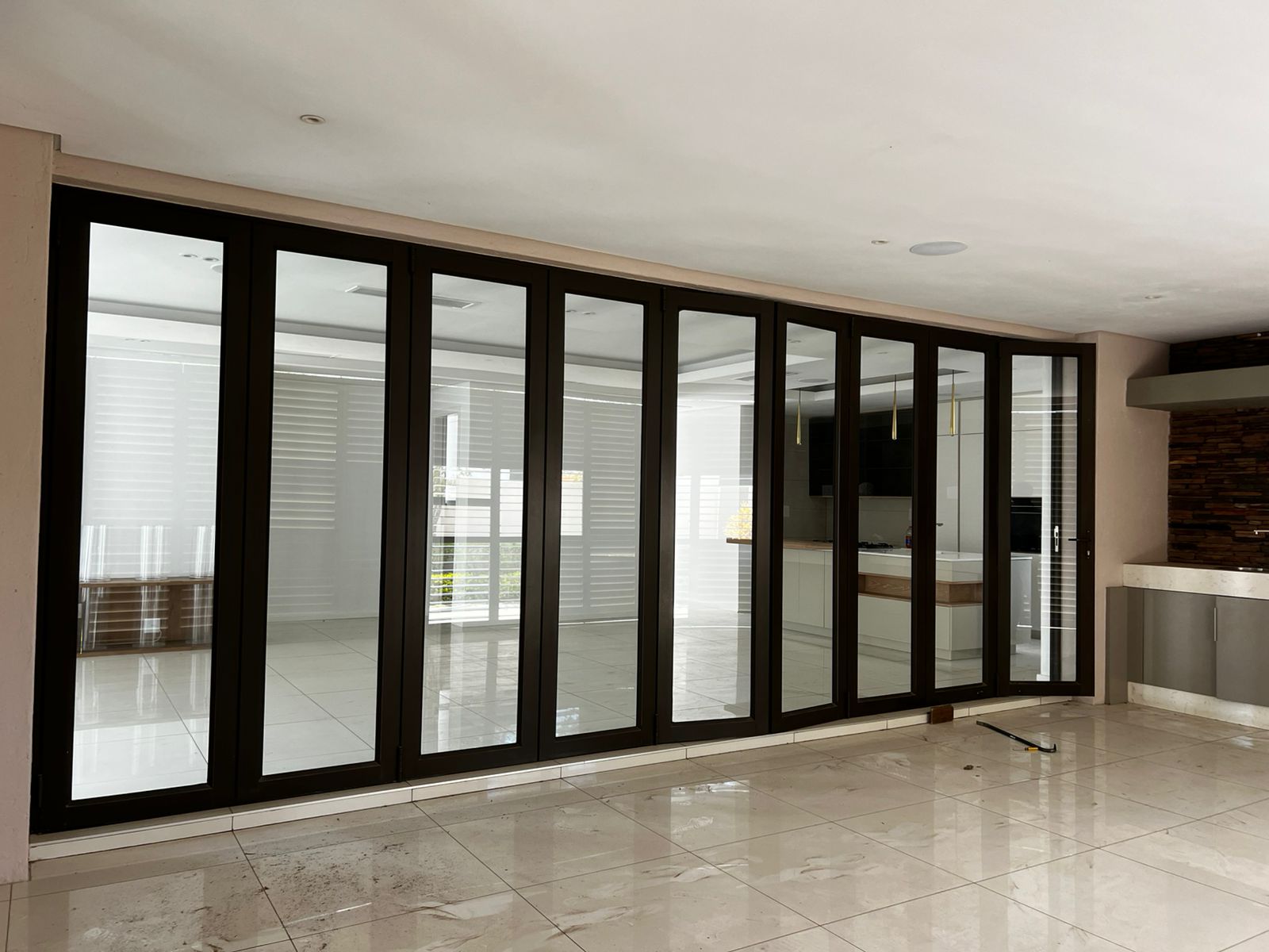 Technicians installing aluminium doors